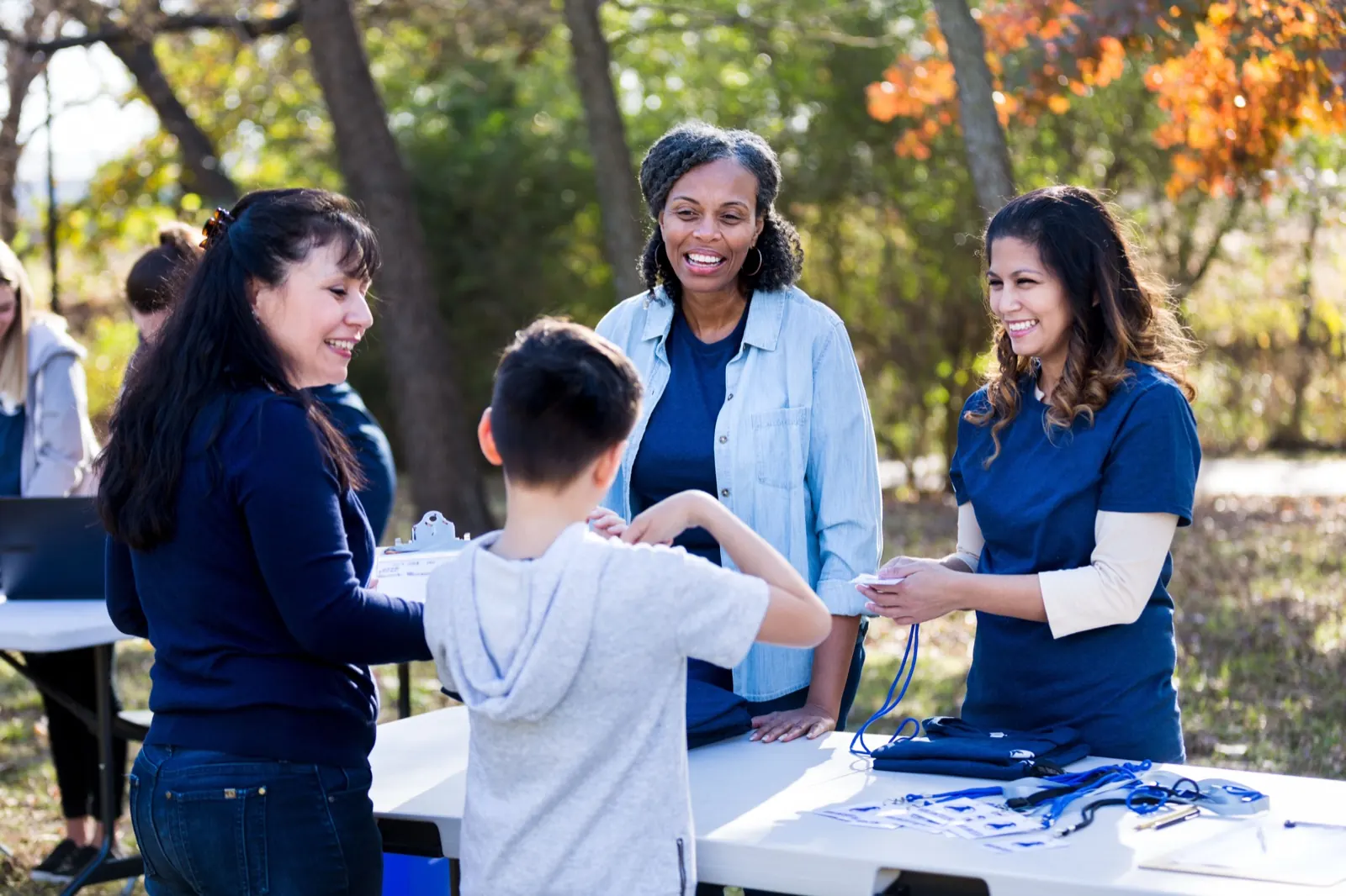 Neighbors working together at a community event